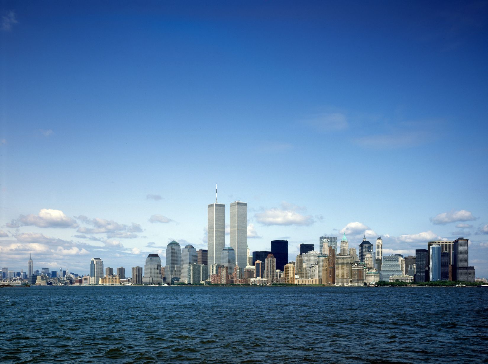 The World Trade Center's Twin Towers and the lower Manhattan skyline, seen from the water, about a month before September 11, 2001.